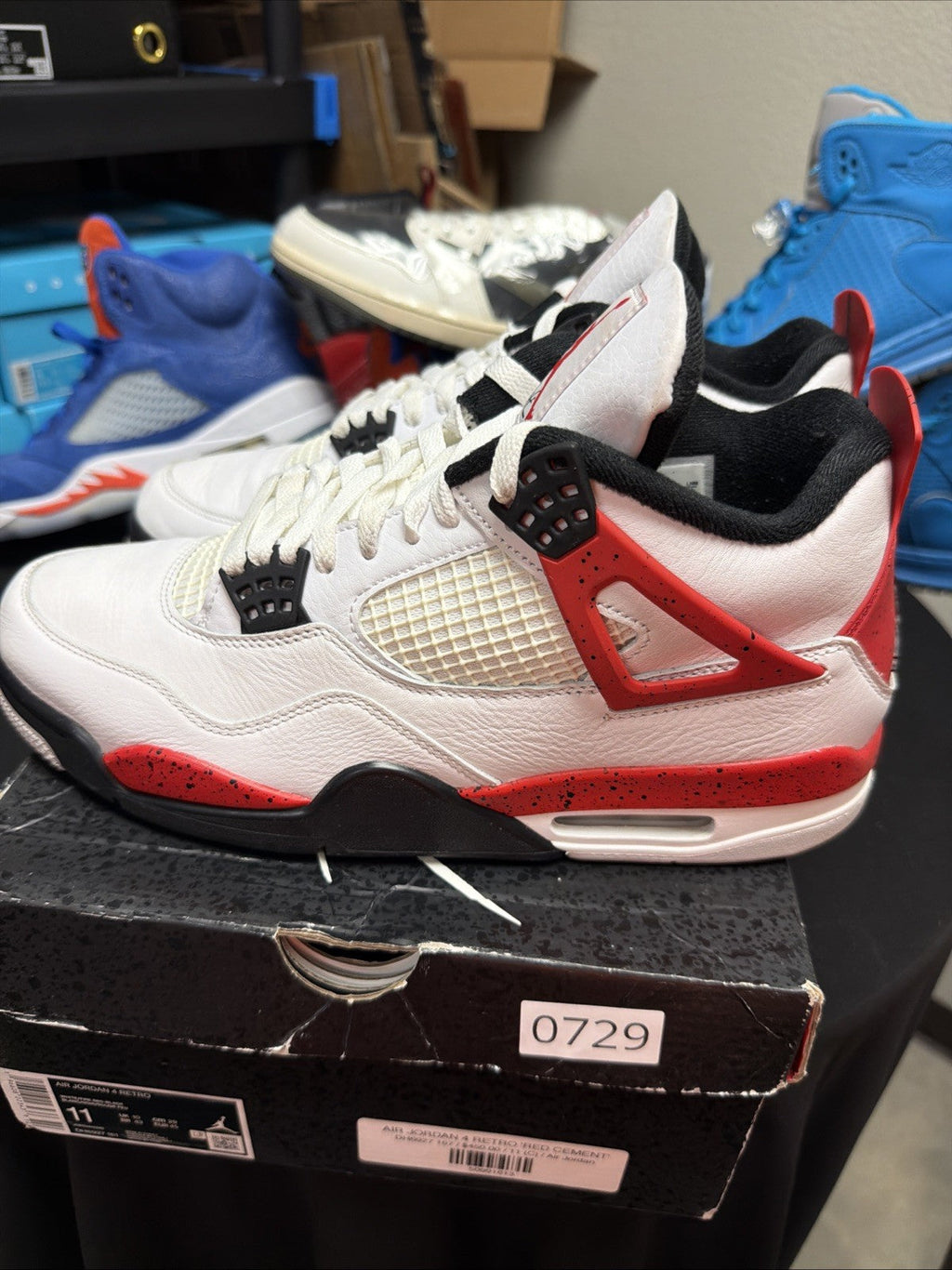 Jordan 4 Retro Mid Red Cement - Size 11 - product image from the listing.