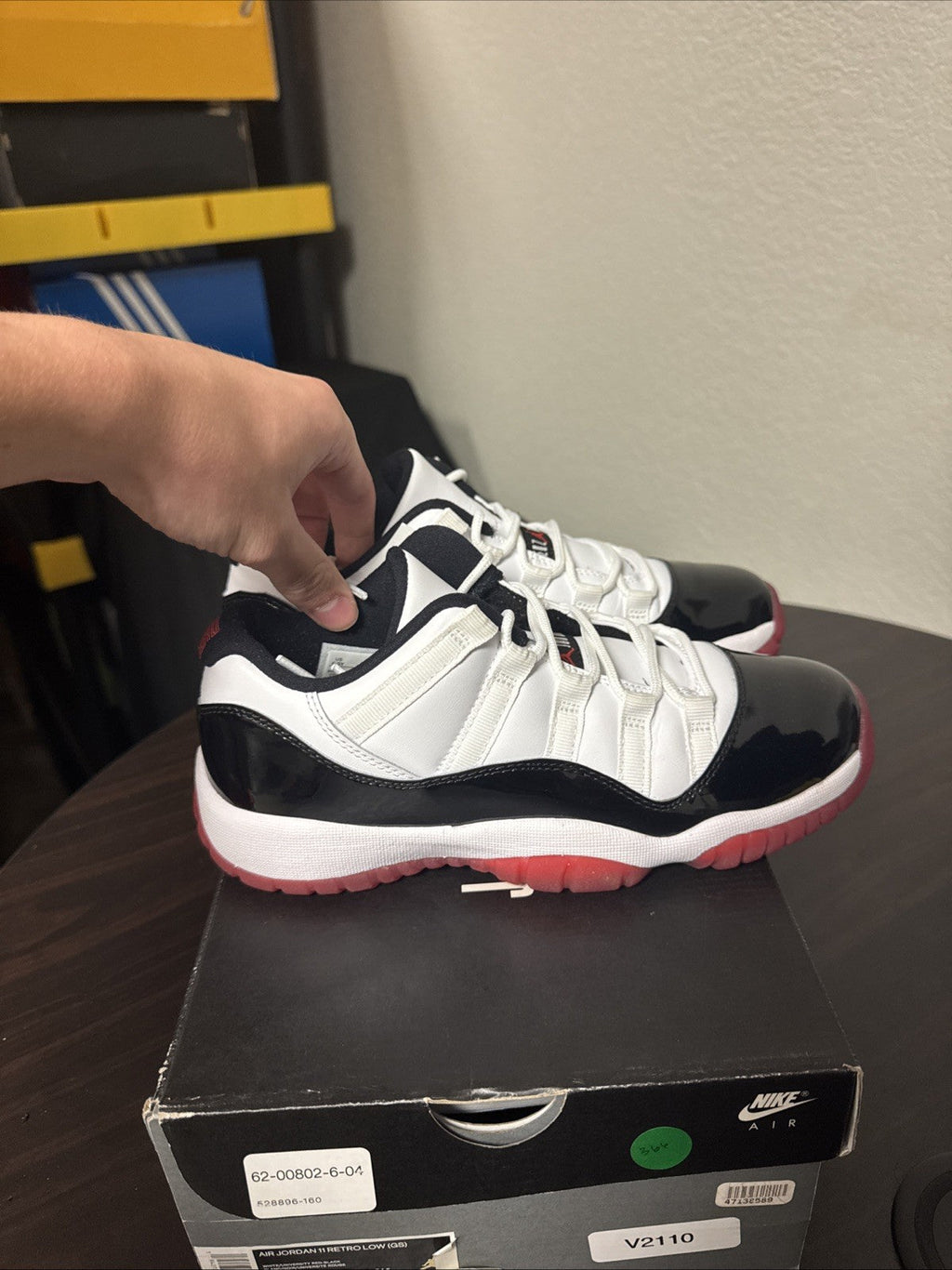 Concord Bred GS Size 6.5Y - Nike Air Jordan 11 Retro Low 528896-160 - product image from the listing.