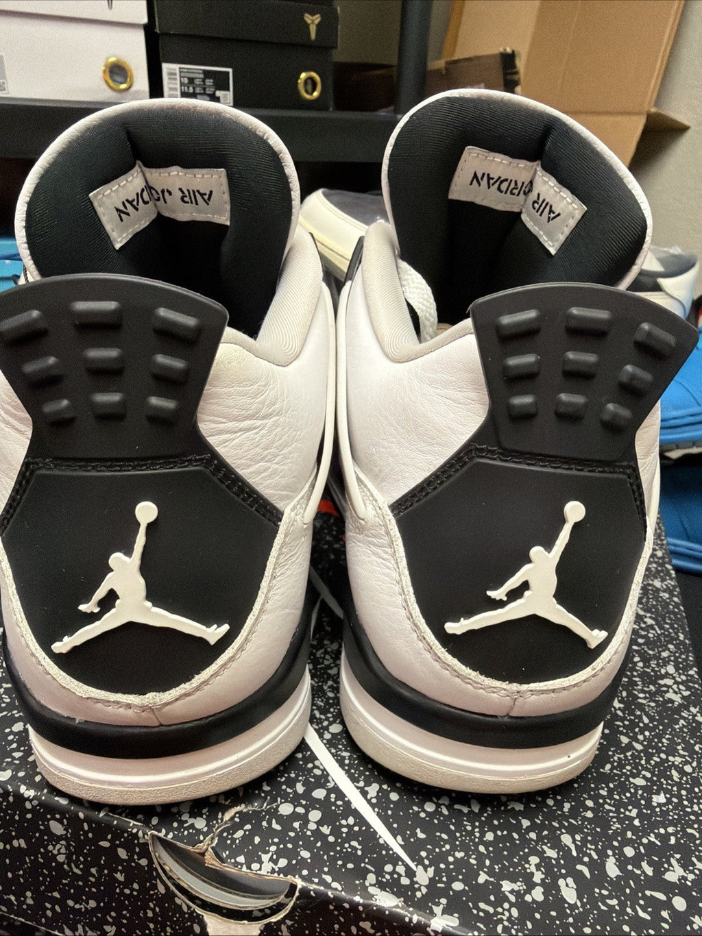 Jordan 4 Retro Mid Military Black - Size 10 - product image from the listing.