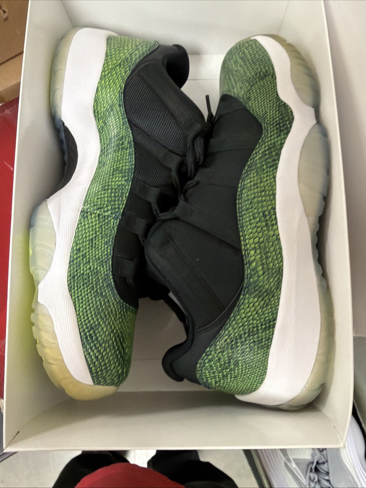 Men's Jordan 11 Low Snakeskin Size 12 Green Black Snakeskin - product image from the listing.