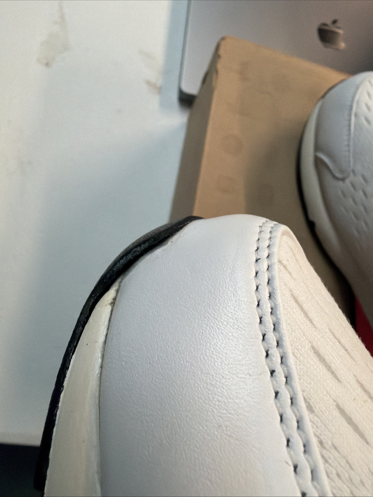 Size 10.5 Nike Air Max 180 EM White Solar in Red - product image from the listing.