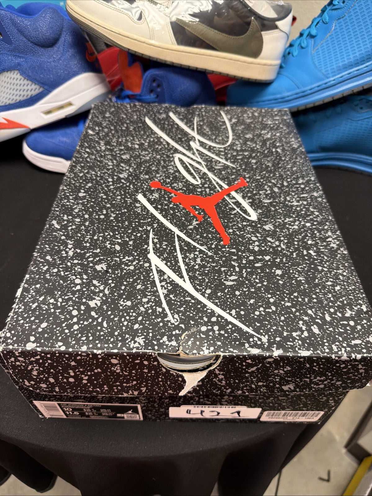 Jordan 4 Retro Mid Military Black - Size 10 - product image from the listing.