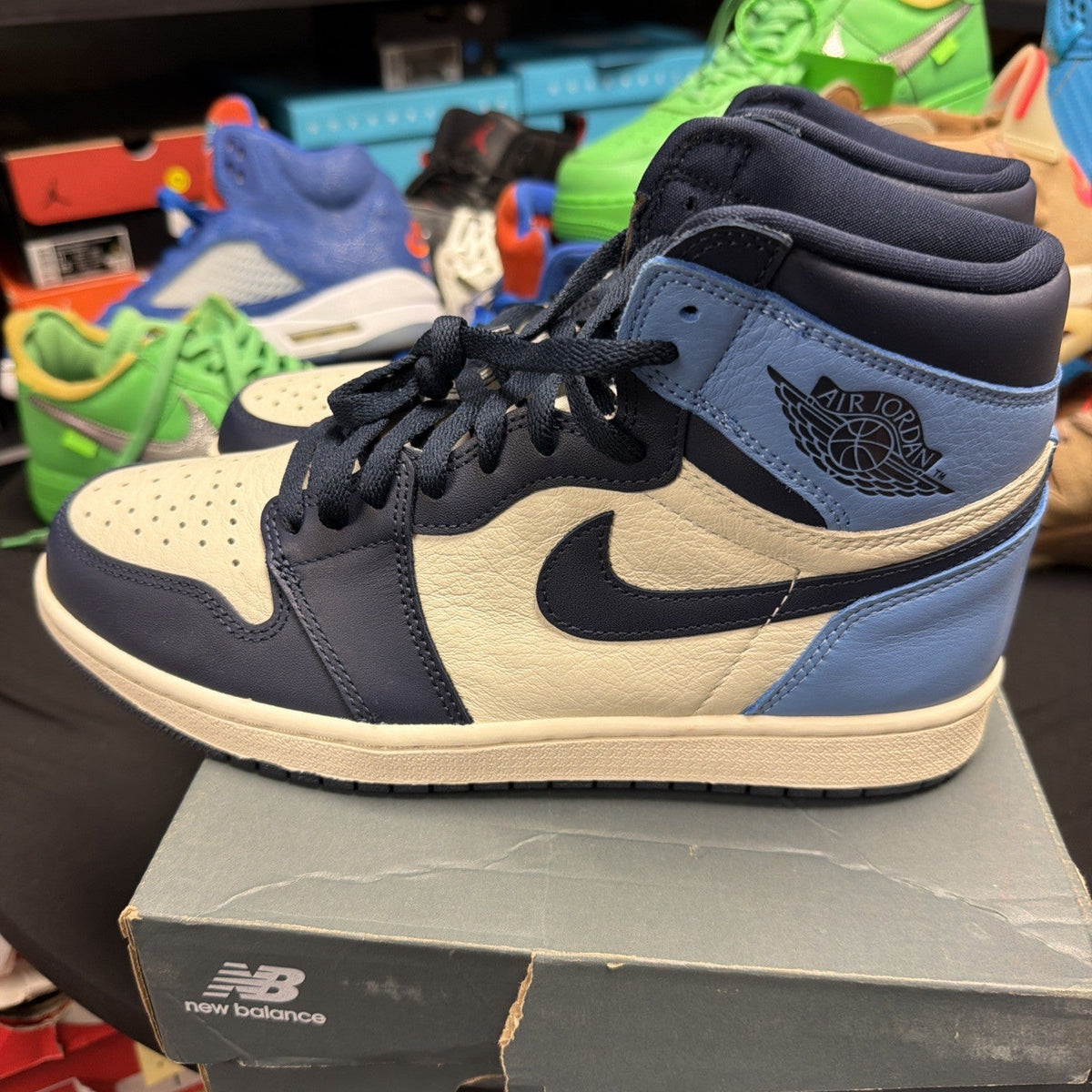 "UNC" Air Jordan 1 High OG Sail/Obsidian-University Blue Size 9.5 555088-140 - product image from the listing.