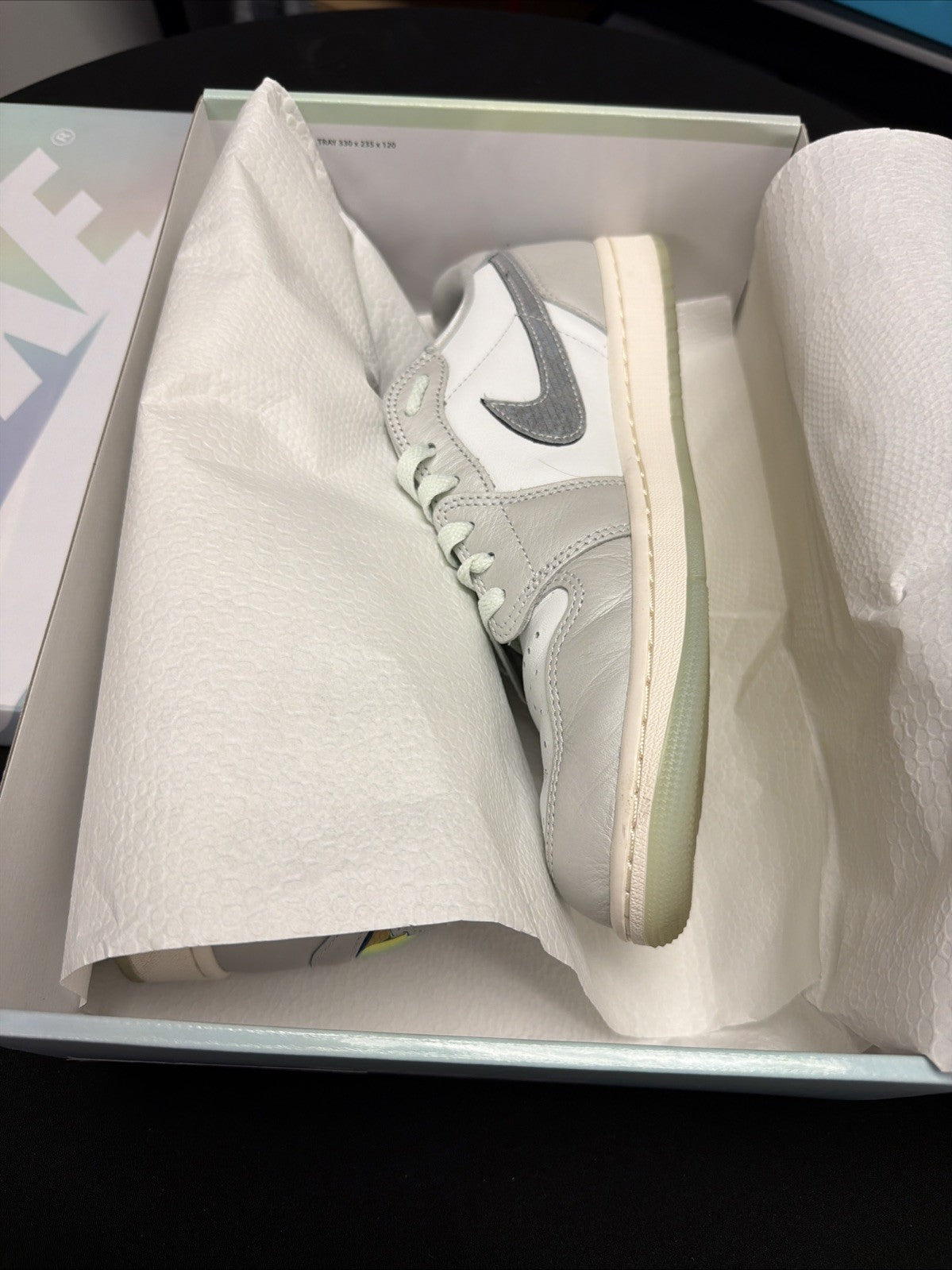 Year of the Snake - Nike Air Jordan 1 Retro Low OG - product image from the listing.
