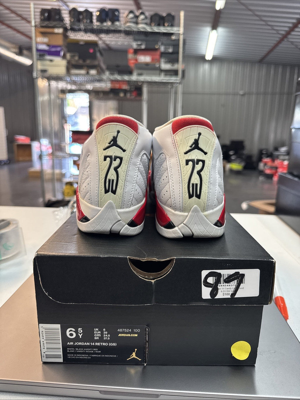 Size 6.5 Y Nike Air Jordan 14 XIV Retro GS Candy Cane Trainers - product image from the listing.