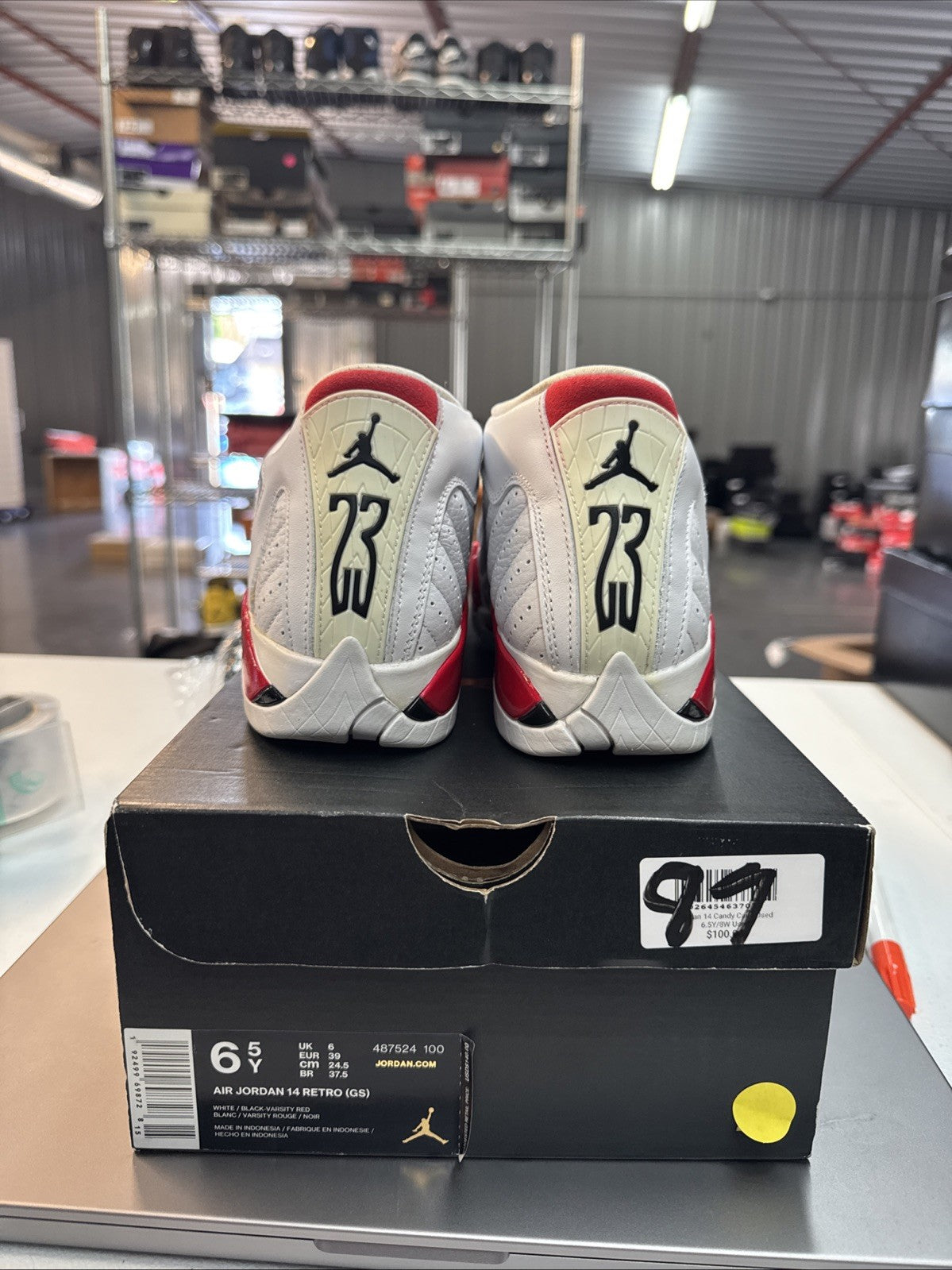 Size 6.5 Y Nike Air Jordan 14 XIV Retro GS Candy Cane Trainers - product image from the listing.