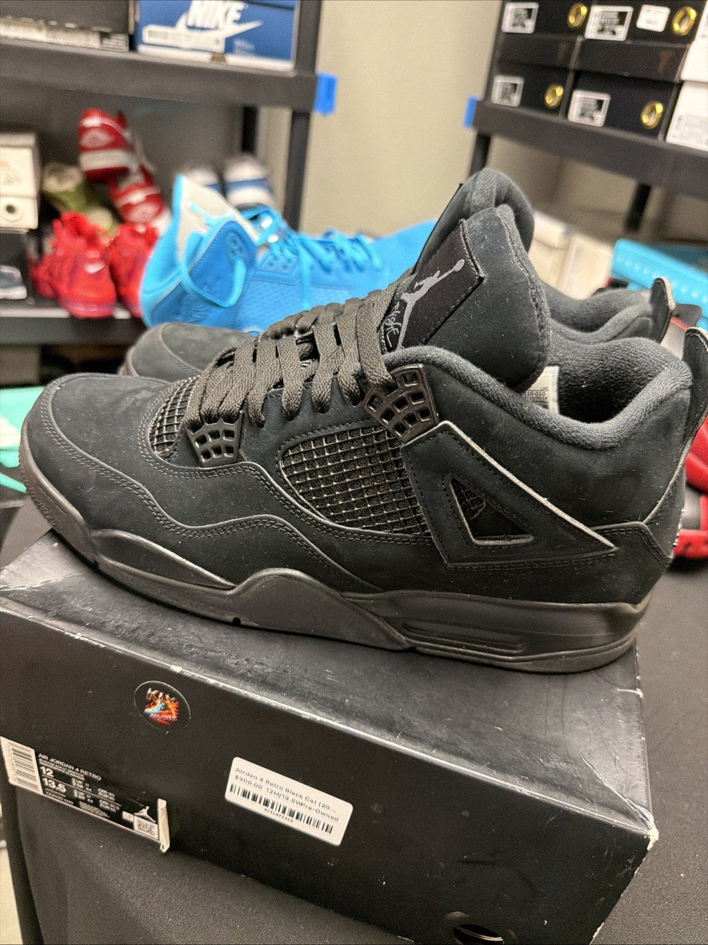 Jordan 4 Retro Mid Black Cat - Size 12 - product image from the listing.