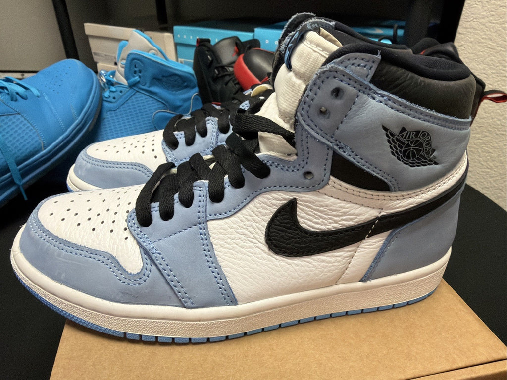 pair of Nike Air Jordan 1 Retro High OG Trainers in the "University Blue 6.5y - product image from the listing.