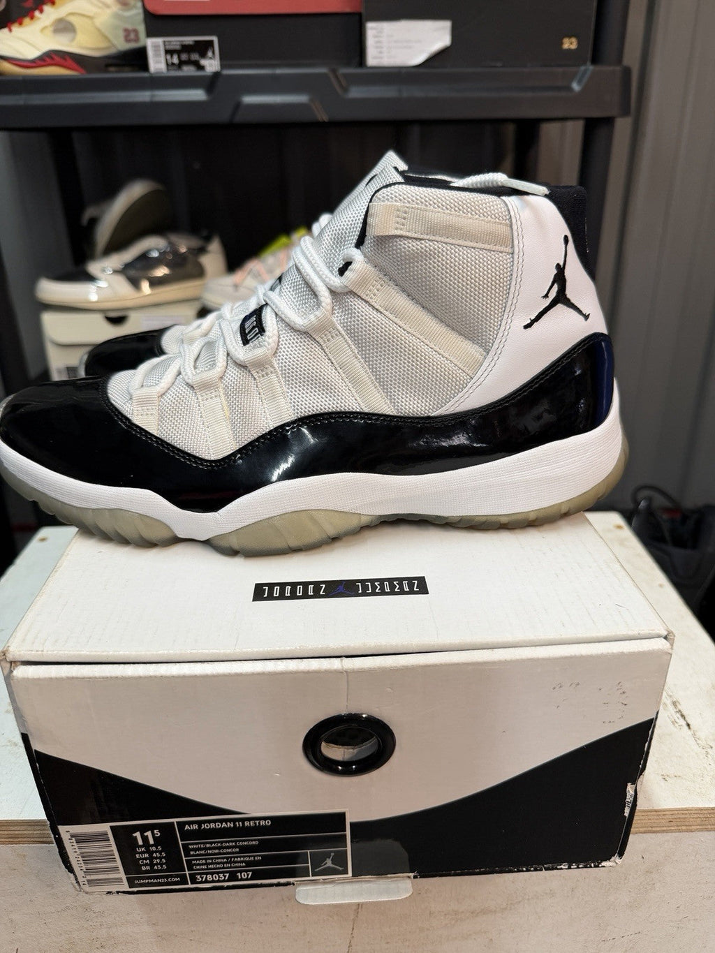 Concord 2011 White Black Size 11.5 Sneakers - Nike Air Jordan 11 Retro 378037-107 - product image from the listing.