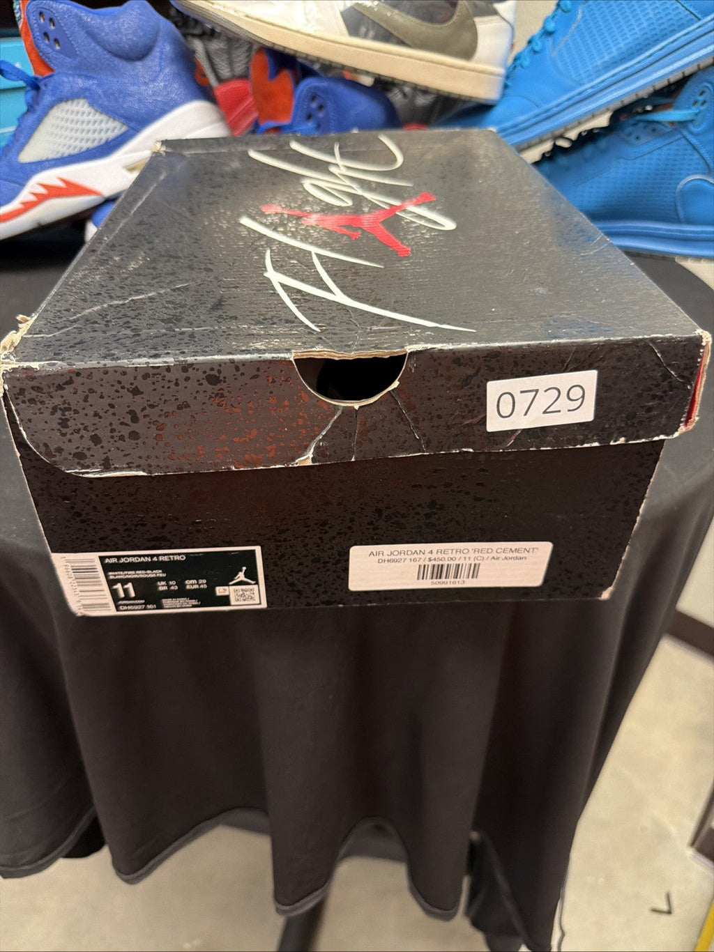 Jordan 4 Retro Mid Red Cement - Size 11 - product image from the listing.