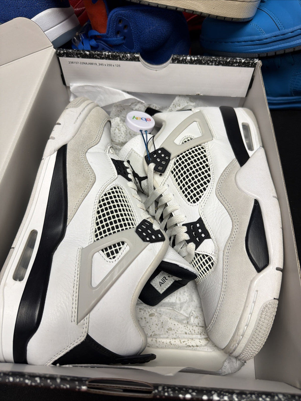 Jordan 4 Retro Mid Military Black - Size 10 - product image from the listing.