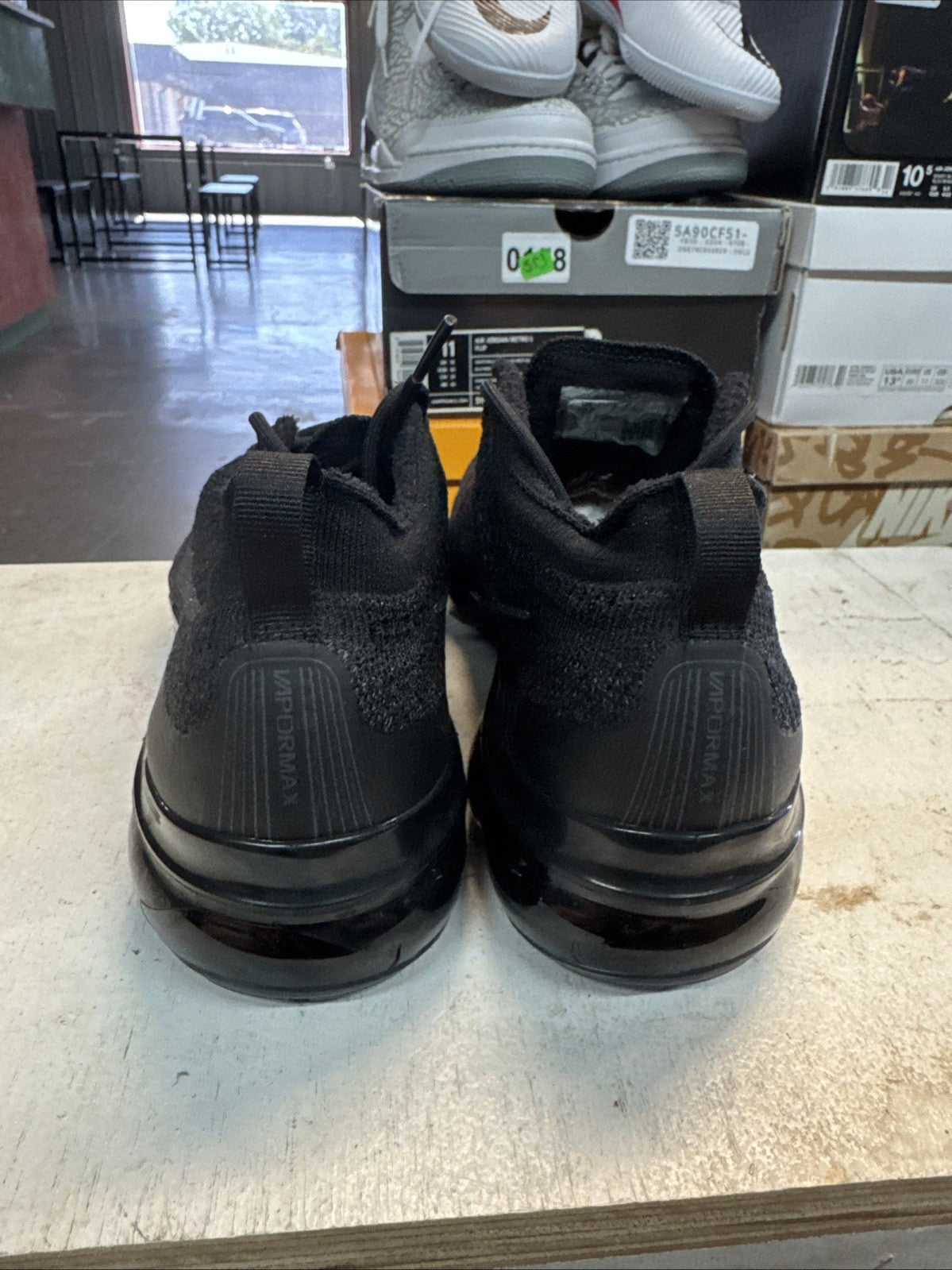 Size 10.5 - Nike Air Vapormax Flyknit Triple Black | Replacement Box for Women - product image from the listing.
