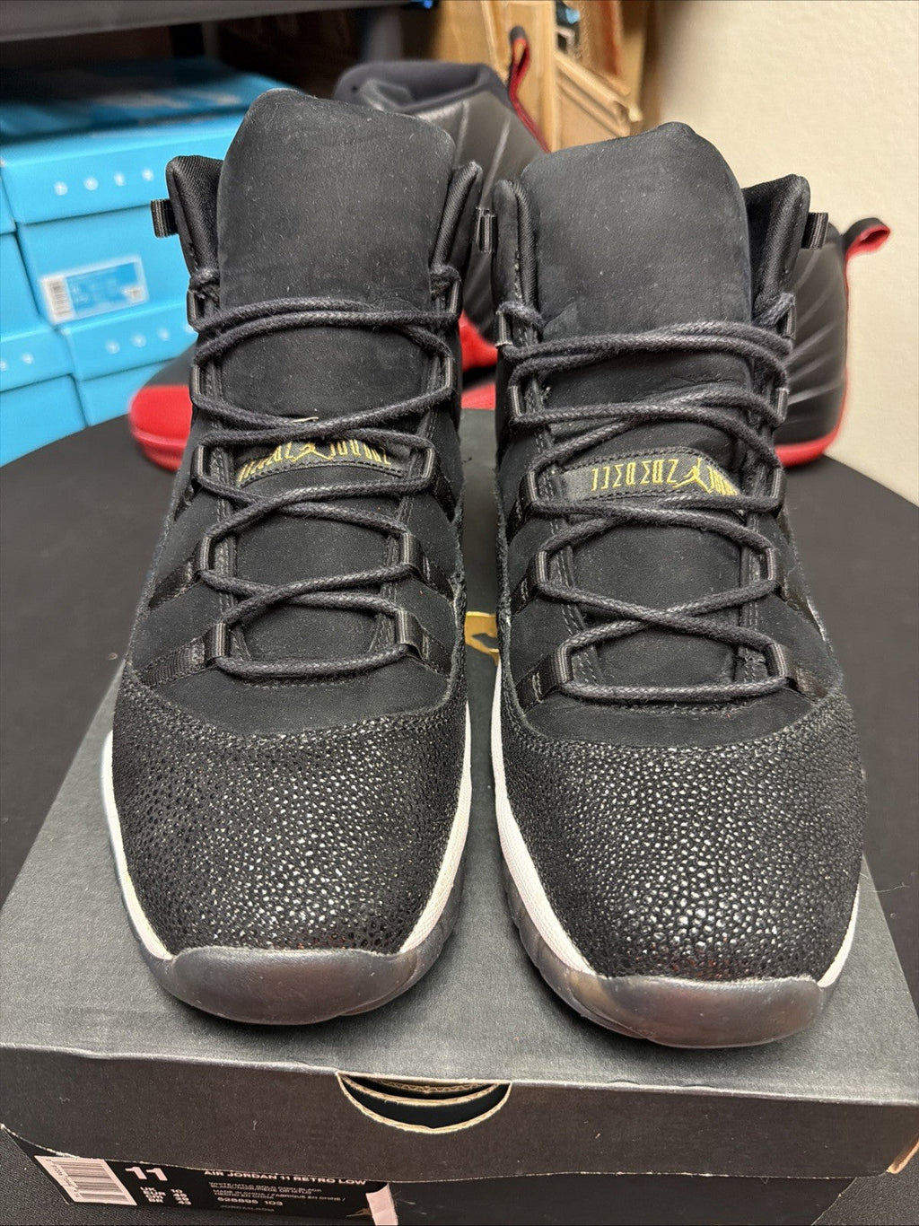 Women's Air Jordan 11 Retro GS Heiress Size 10Y / 11.5 2017 Black Gold 852625-030 - product image from the listing.