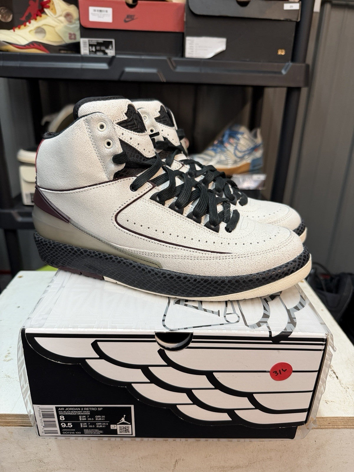 Men's A Ma Maniere Jordan 2 Retro SP Airness 8 DO7216-100 Sail Burgundy - product image from the listing.