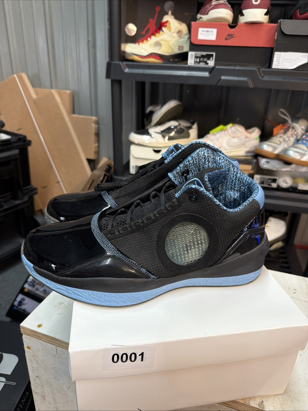 Men's Air Jordan 2010 Black Uni Blue Leather Athletic Shoes Size 12 387358-003 - product image from the listing.
