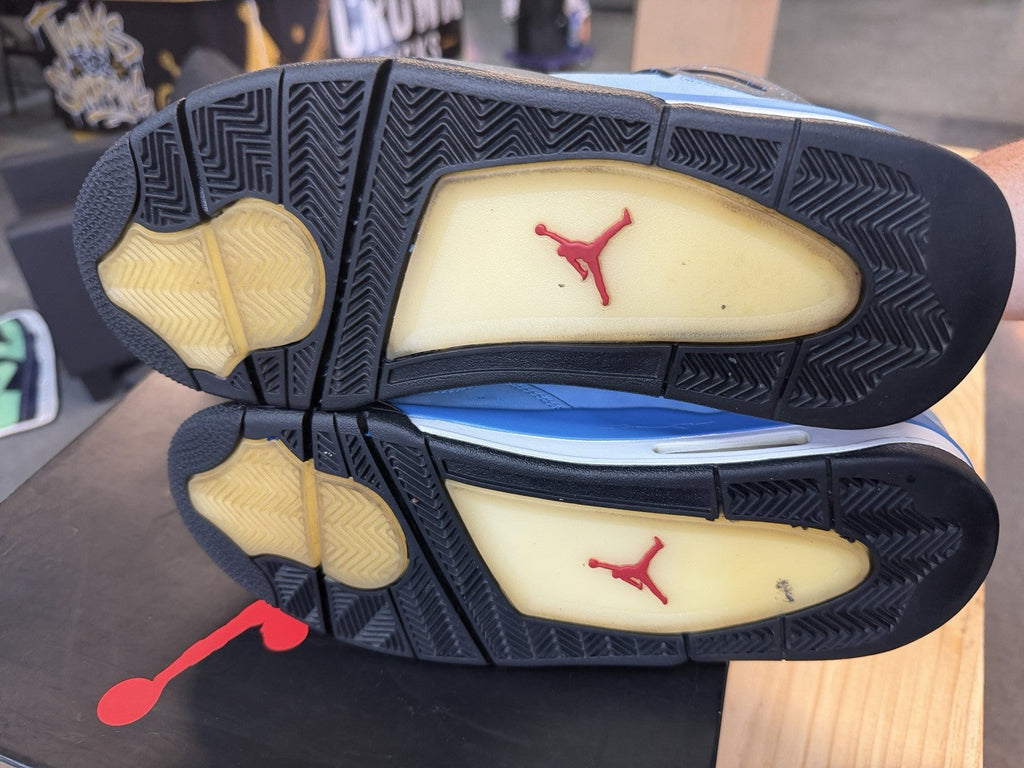 Travis Scott 4s Size 11 - product photo shown in the listing for this item.
