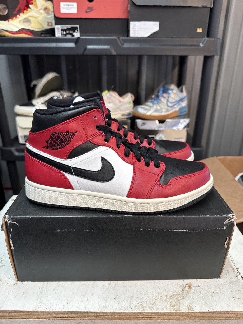 - Red, Black & White Chicago Size 9 MJ - Nike Air Jordan 1 Mid - product image from the listing.