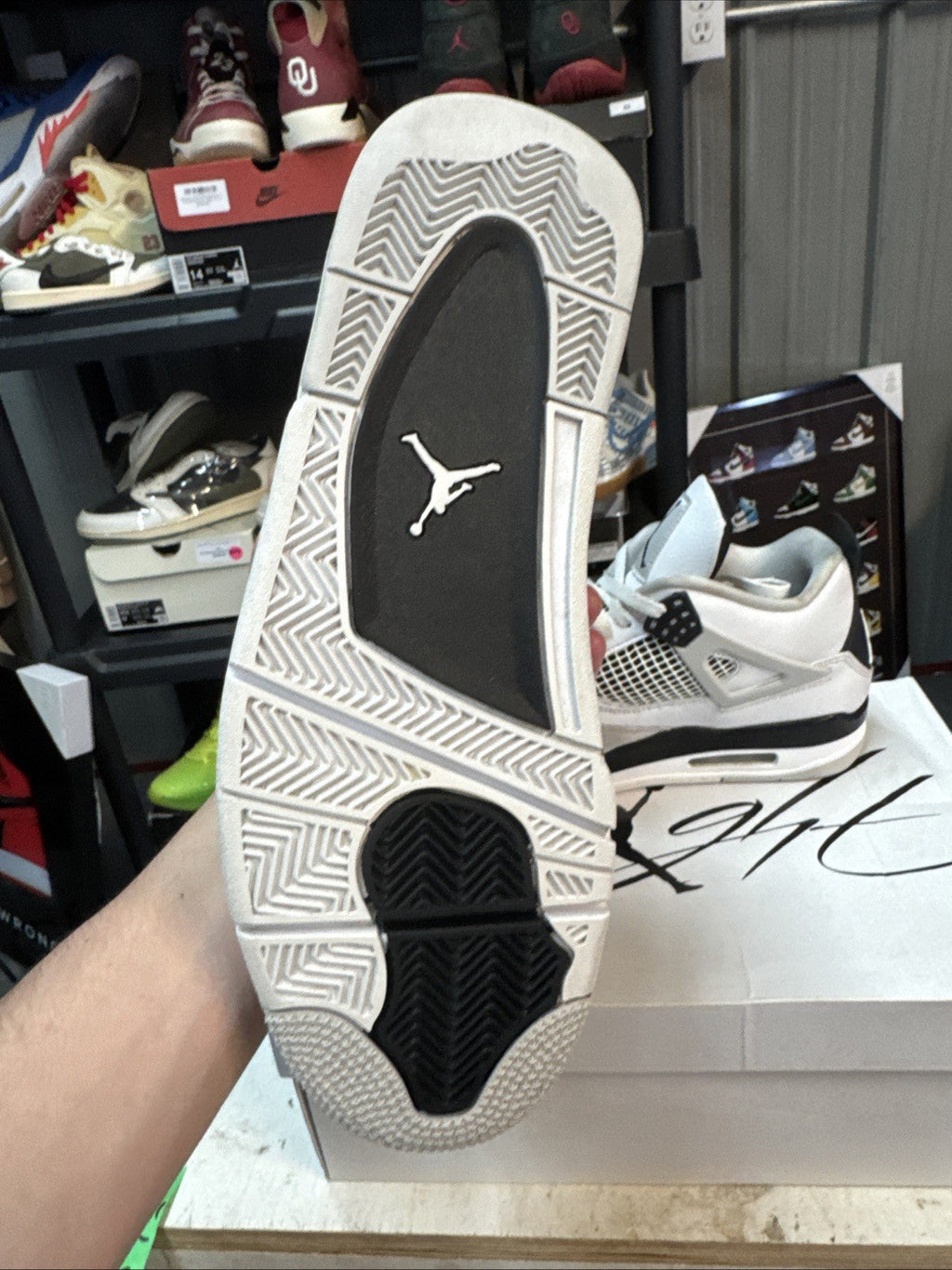 "Military Black" Size 10 - Jordan 4 Retro White and Black - product image from the listing.