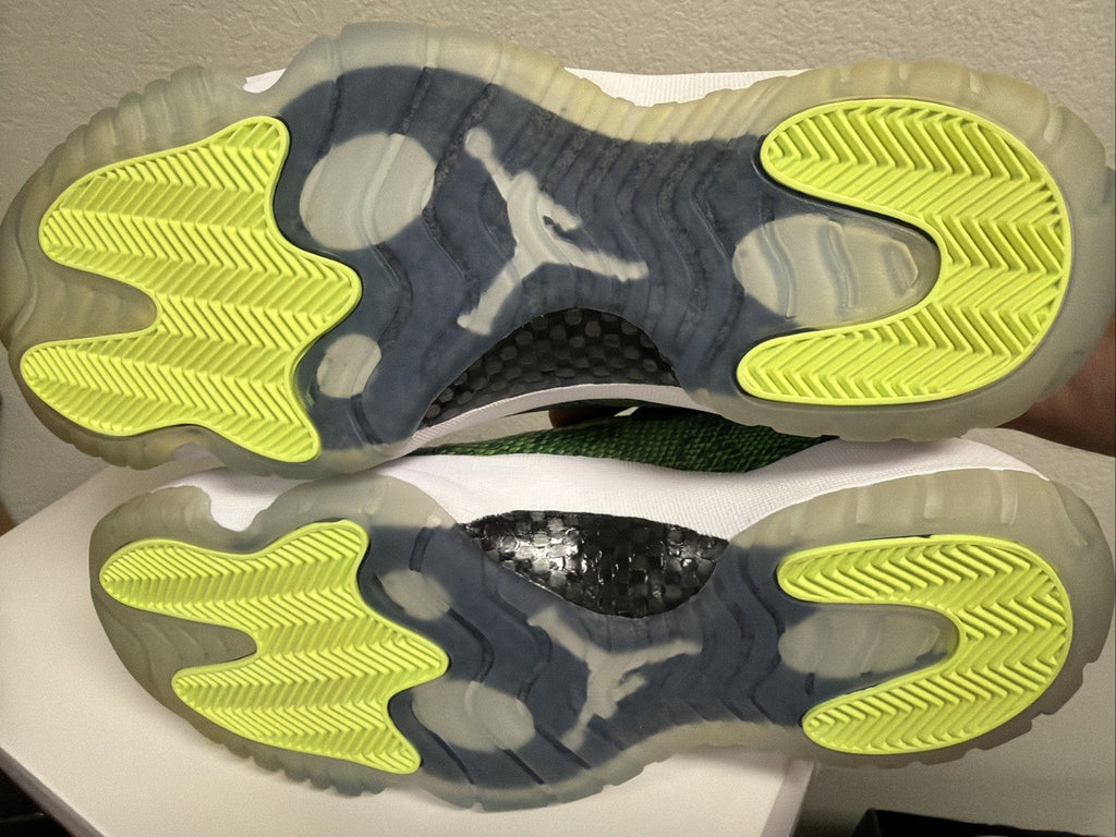 Men's Jordan 11 Low Snakeskin Size 12 Green Black Snakeskin - product image from the listing.