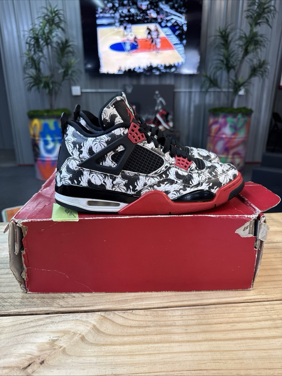 "Tattoo" size 11 - (2018) Jordan 4 - product image from the listing.