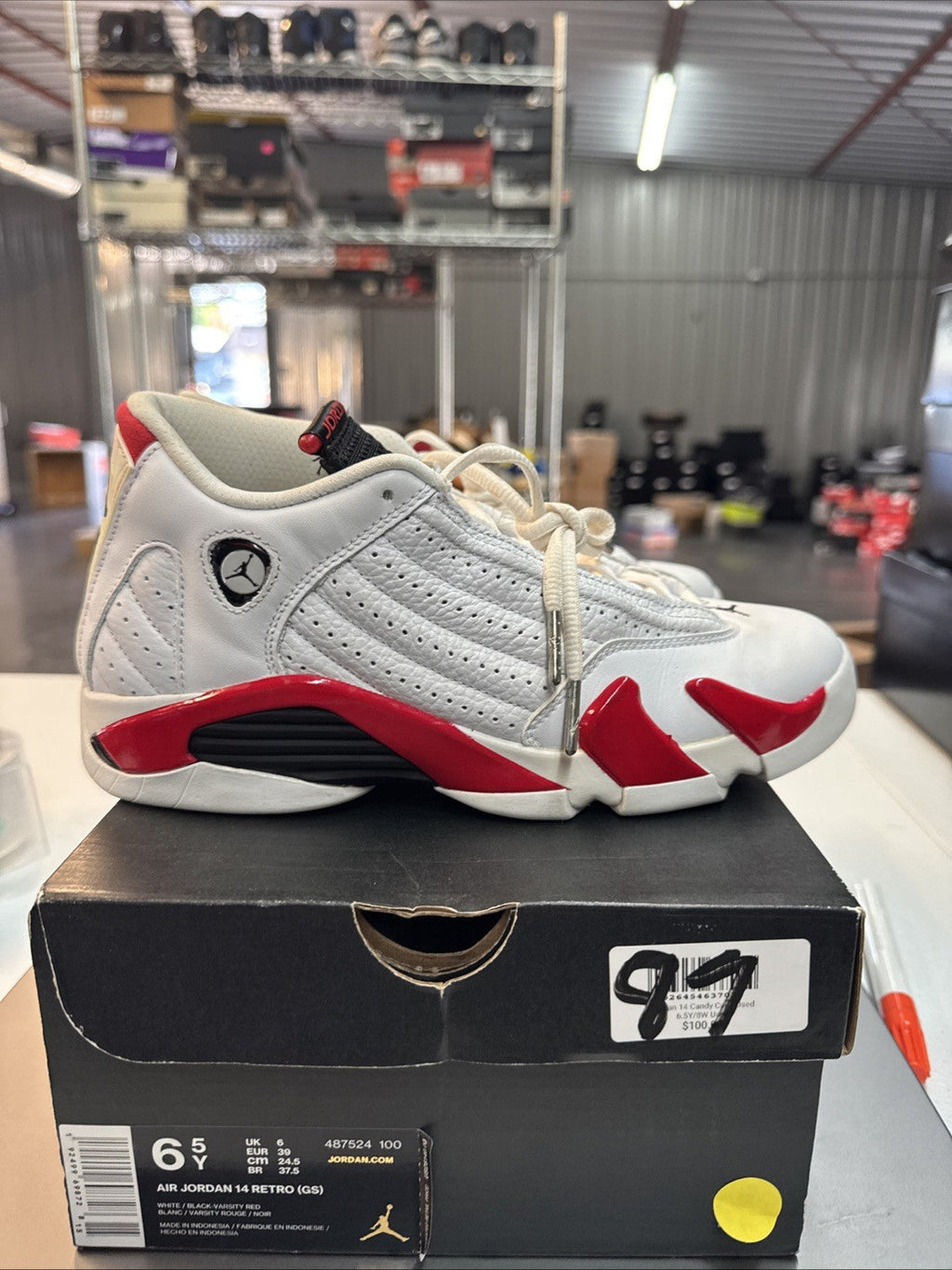 Size 6.5 Y Nike Air Jordan 14 XIV Retro GS Candy Cane Trainers - product image from the listing.