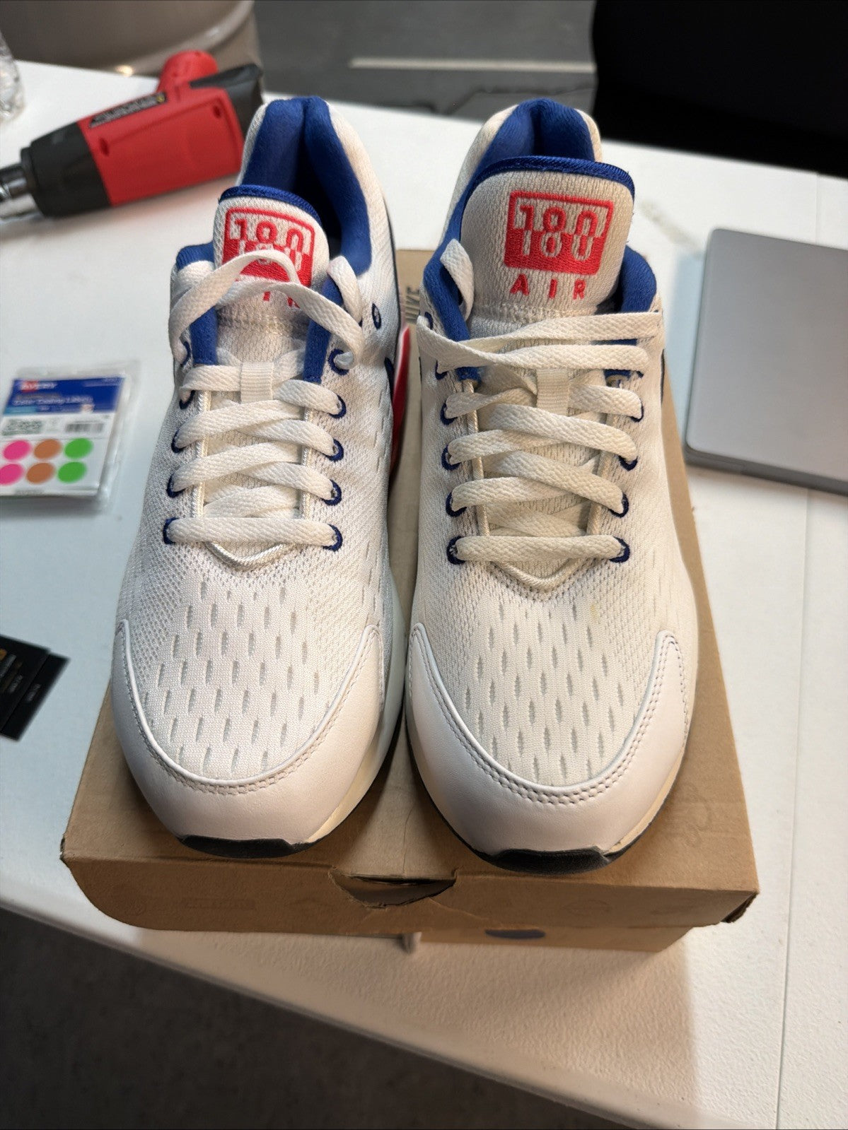 Size 10.5 Nike Air Max 180 EM White Solar in Red - product image from the listing.