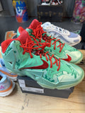 Nike LeBron XI 11 Christmas 2013 Crimson Arctic Green Glow Footwear 616175-301 Sz13 - product image from the listing.