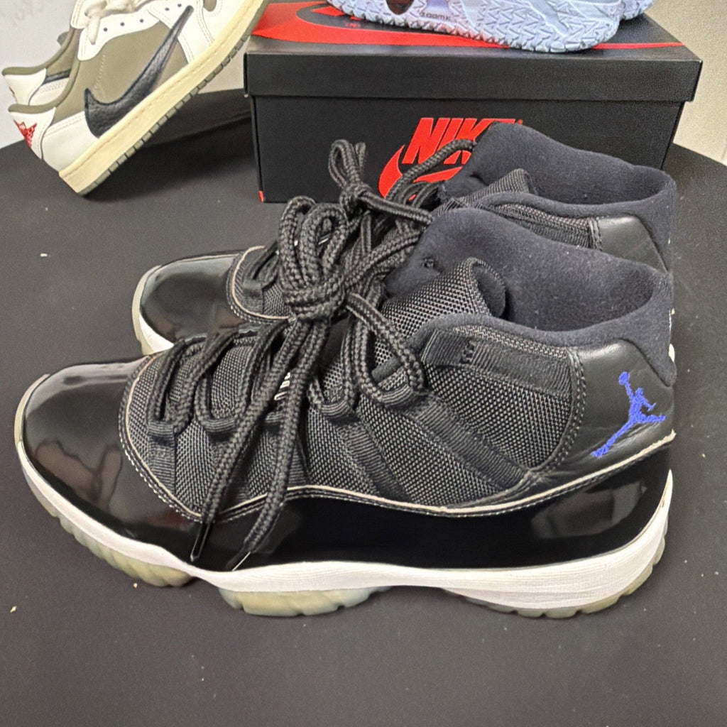 Air Jordan 11 Retro Space Jam High Top Sneaker Black White Concord - product image from the listing.