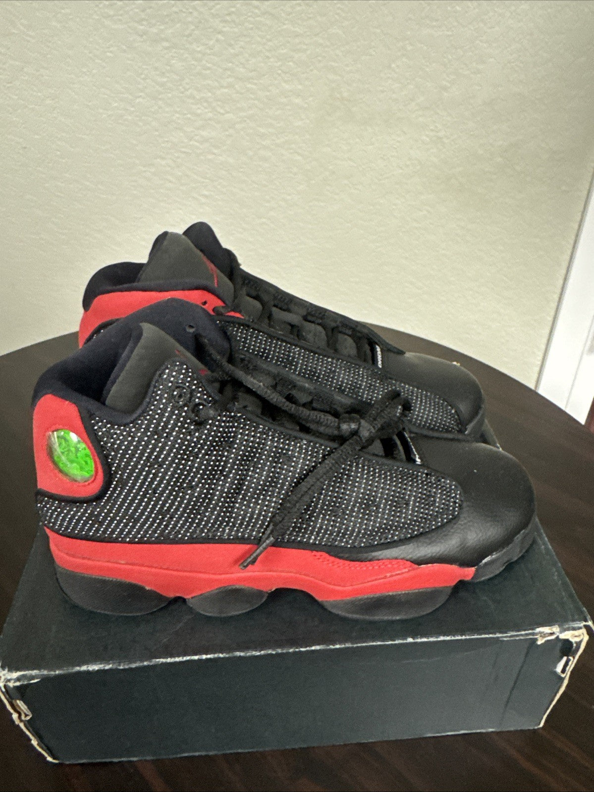 "Bred" NIKE Air Jordan 13 Retro GS 2017 BLACK/ TRUE RED 414574-004 Youth 5y - product image from the listing.