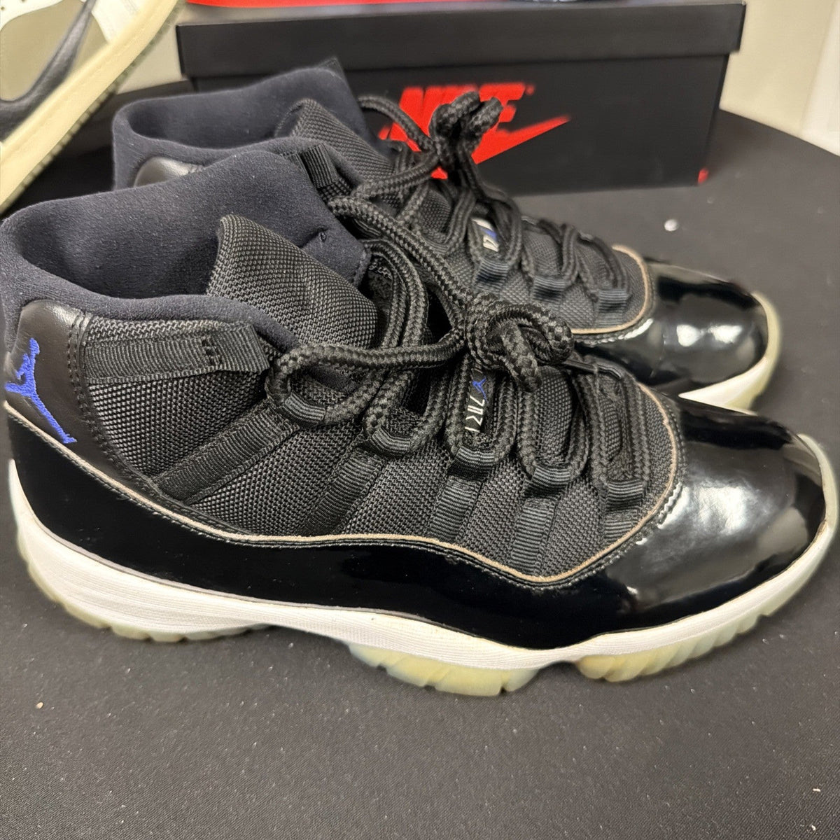 Air Jordan 11 Retro Space Jam High Top Sneaker Black White Concord - product image from the listing.