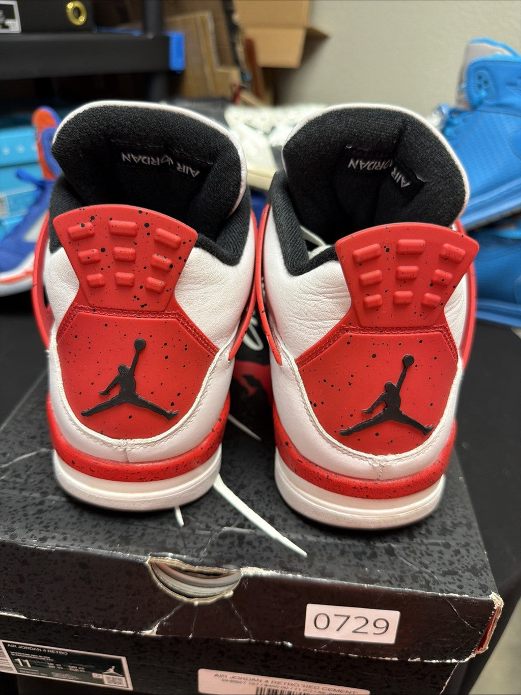 Jordan 4 Retro Mid Red Cement - Size 11 - product image from the listing.