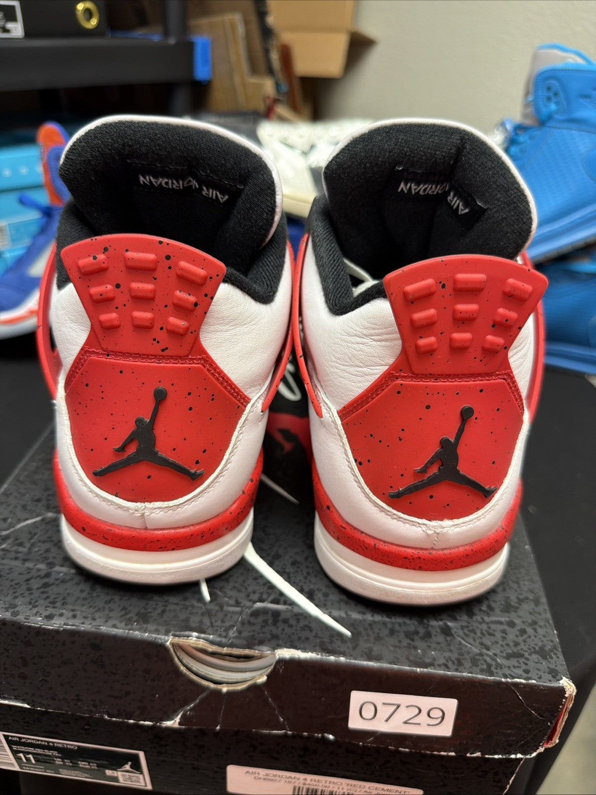 Jordan 4 Retro Mid Red Cement - Size 11 - product image from the listing.