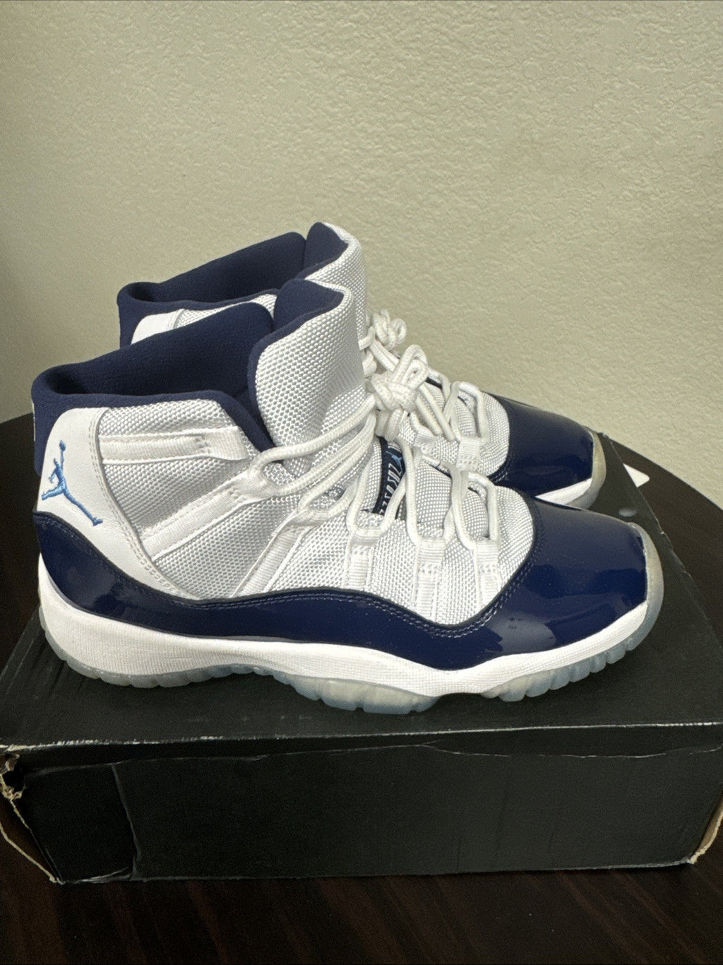 XI Retro Youth Win Like 82 White Blue Size 5Y | Worn Once - Nike Air Jordan 11 - product image from the listing.