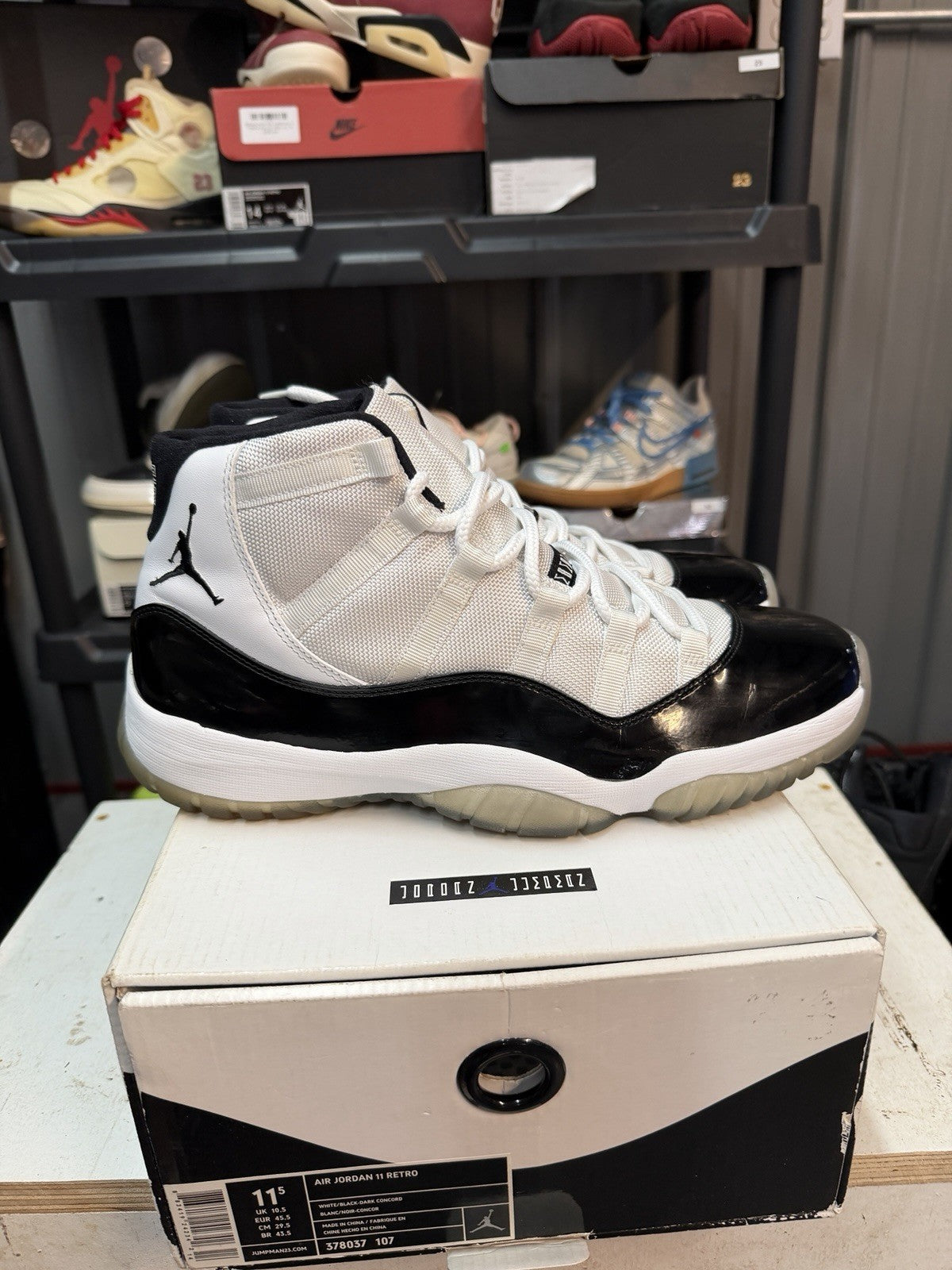 Concord 2011 White Black Size 11.5 Sneakers - Nike Air Jordan 11 Retro 378037-107 - product image from the listing.