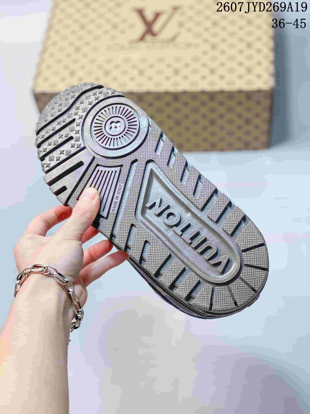 Louis Vuitton Trainer Maxi Low-Top Sneakers in Brown - product image from the listing.