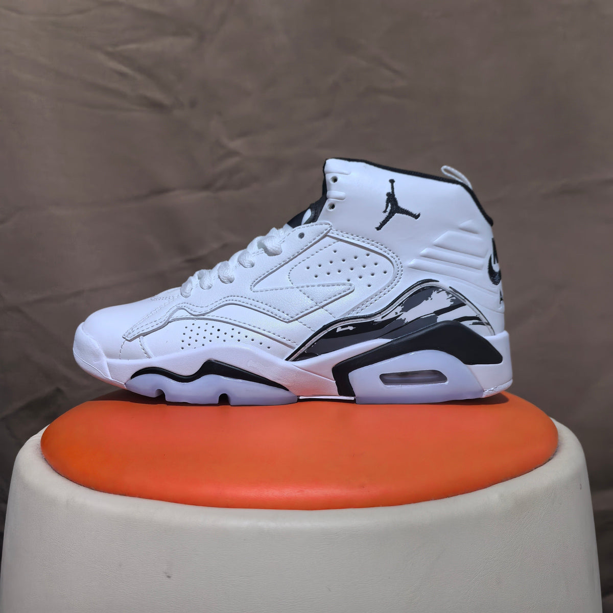 Jordan 6 Retro High-Top Sneakers in White and Black - product image from the listing.