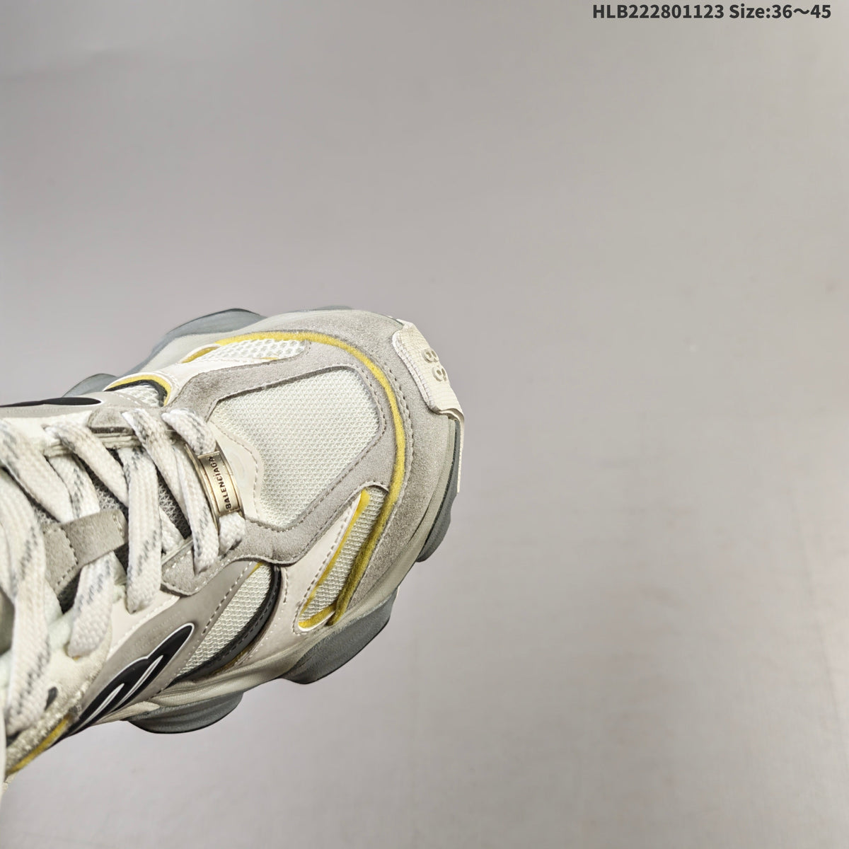Gray and White Balenciaga Monday Low-Top Sneakers - product image from the listing.