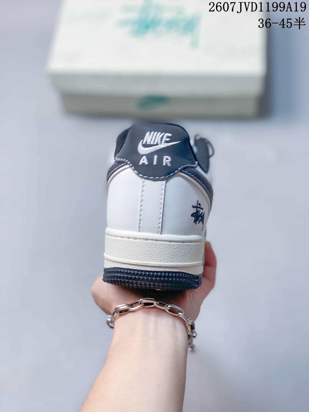 Nike Air Force 1 Low in White Black 2607JVD1199A19 - product image from the listing.