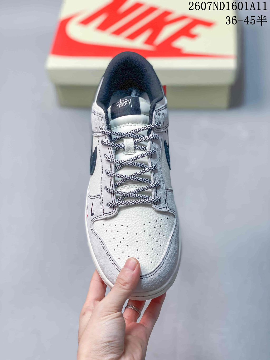 Nike SB Dunk Low Sneakers in Off-White White Navy 2607ND1601A11 - product image from the listing.