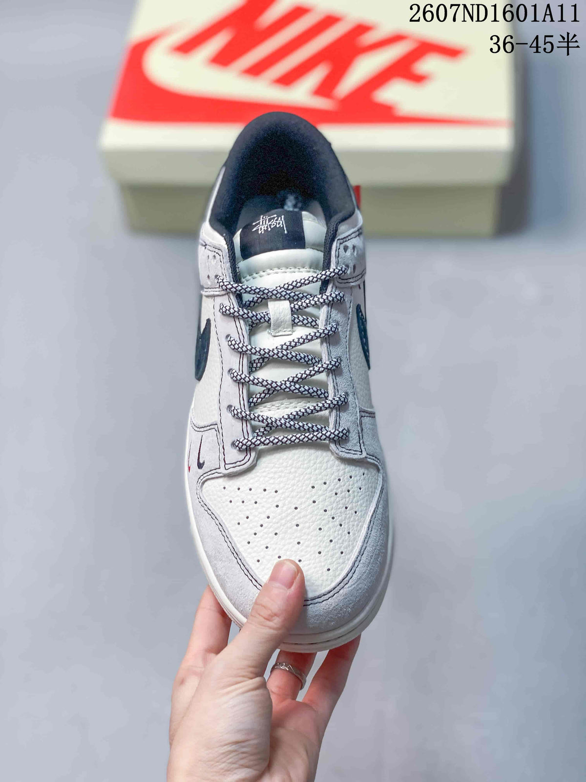 Nike SB Dunk Low Sneakers in Off-White White Navy 2607ND1601A11 - product image from the listing.