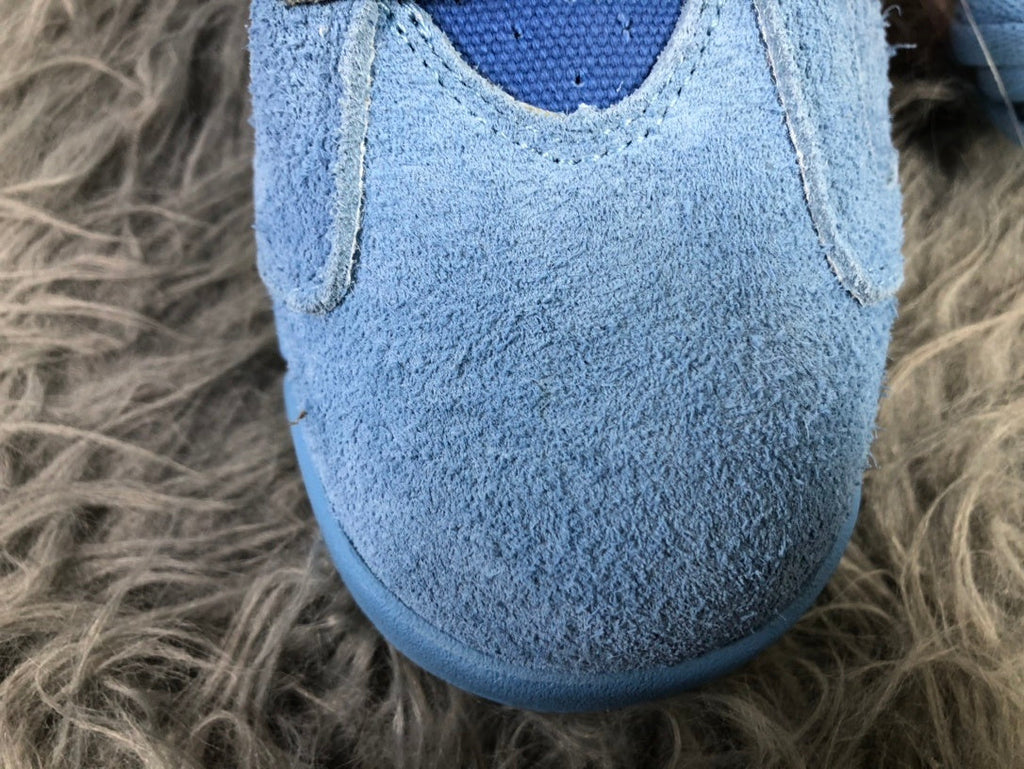 Jordan AJ6 Travis Sky High-Top Sneakers in Blue - product image from the listing.