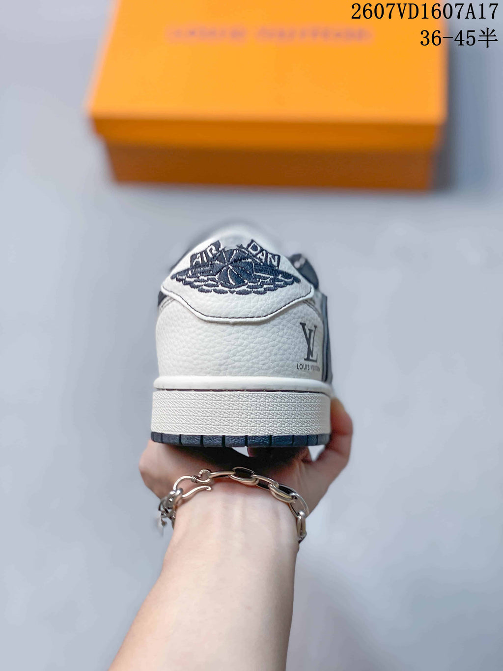 White Navy Monogram Sneakers - Jordan 1 Low - product image from the listing.