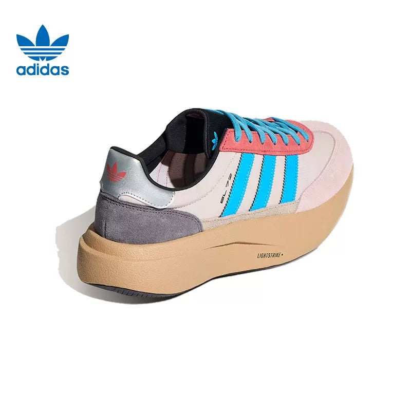 Adidas Lightstrike Sneakers in Pink White Blue - product image from the listing.