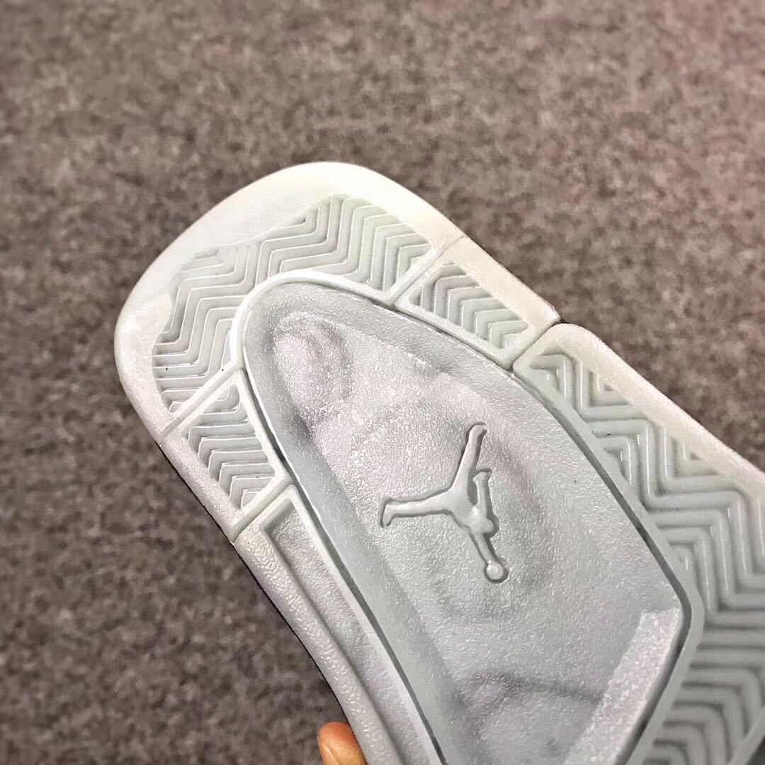 Grey Jordan 4 KAWS Sample High-Top Sneakers - product image from the listing.
