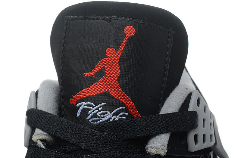 Jordan 4 Retro Basketball Shoes in Black/Red - product image from the listing.