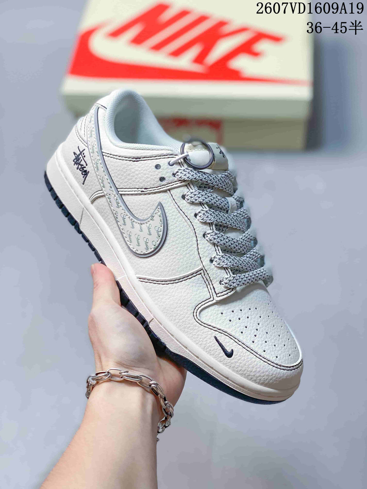 Nike Dunk Low Retro Sneakers in White Navy 2607VD1609A19 - product image from the listing.