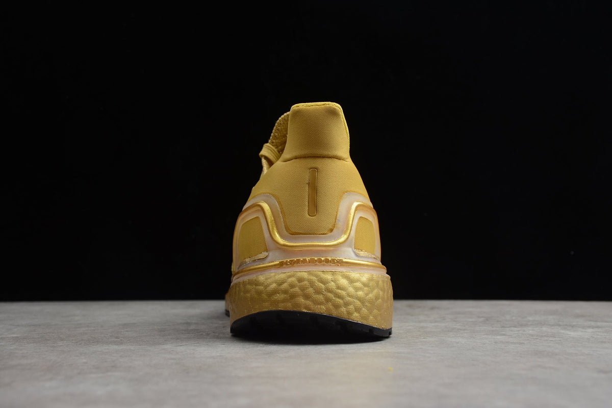 Adidas UltraBOOST 20 Consortium 6.0 Running Shoes in Gold FY3448 - product image from the listing.
