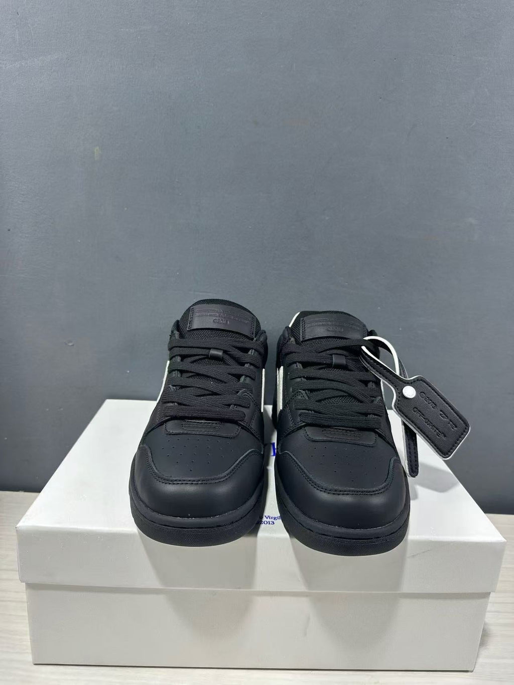 Off-White Out Of Office Low-Top Sneakers in Black White OMAI89C99LEA0191001 - product image from the listing.