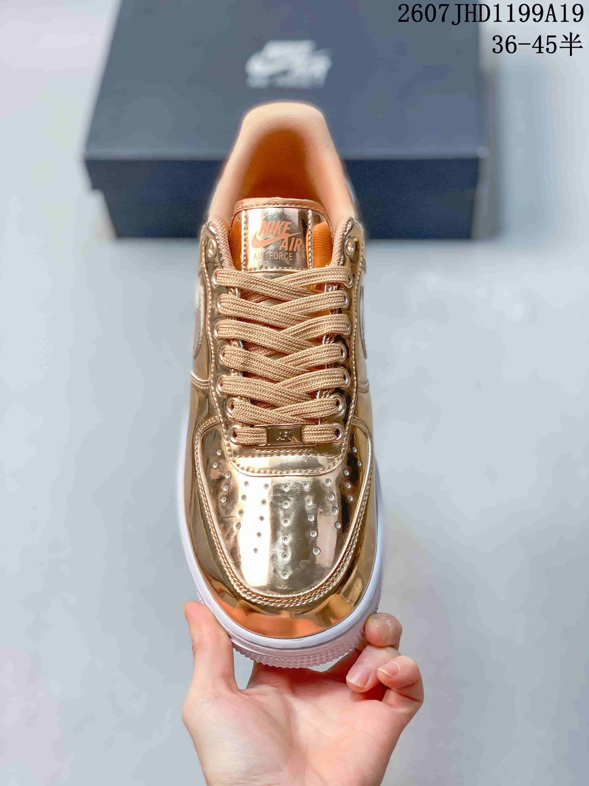 Nike Air Force 1 '07 Low Sneakers in Metallic Gold - product image from the listing.