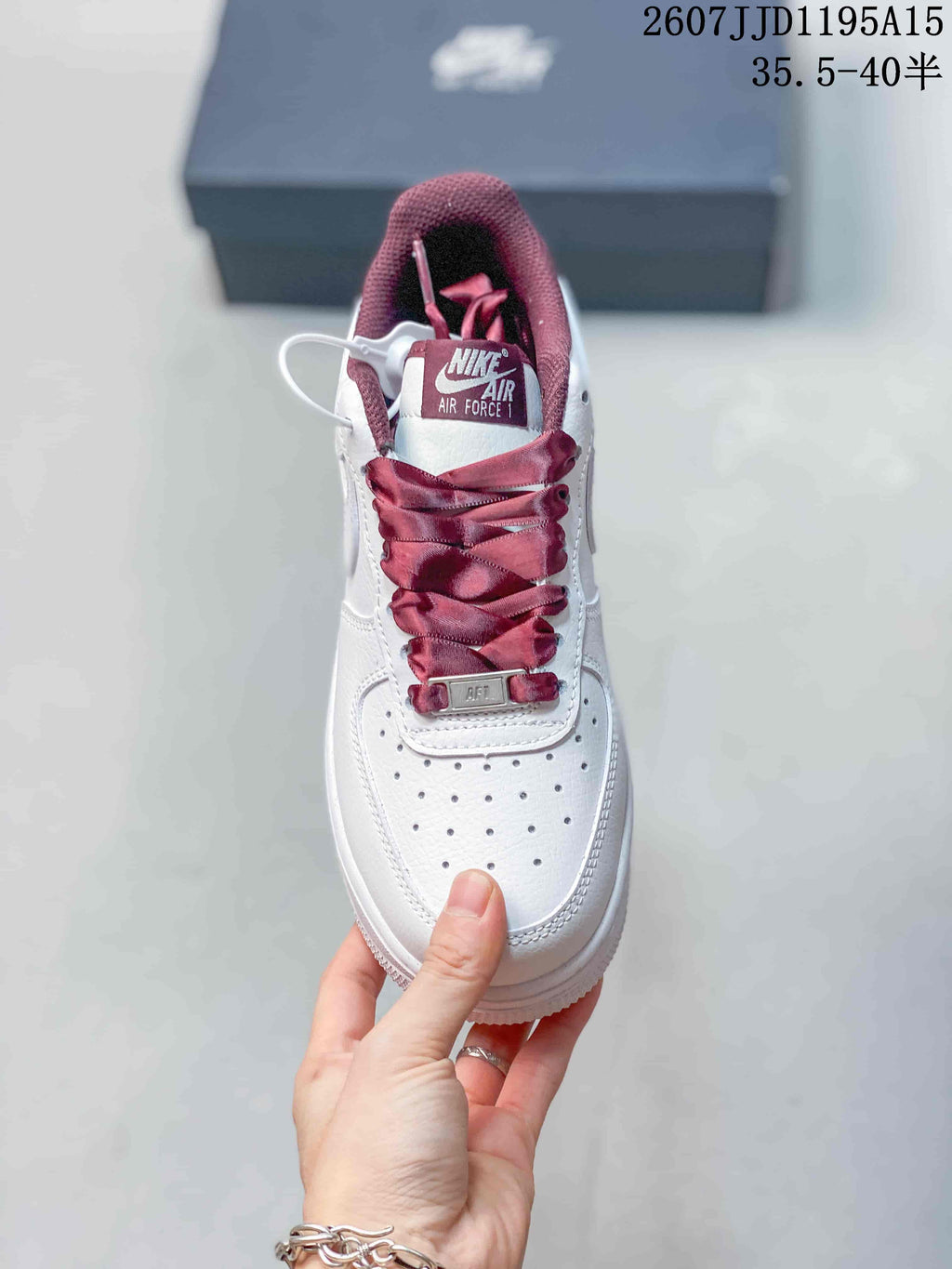 Nike Air Force 1 '07 Low Sneakers in White Burgundy - product image from the listing.